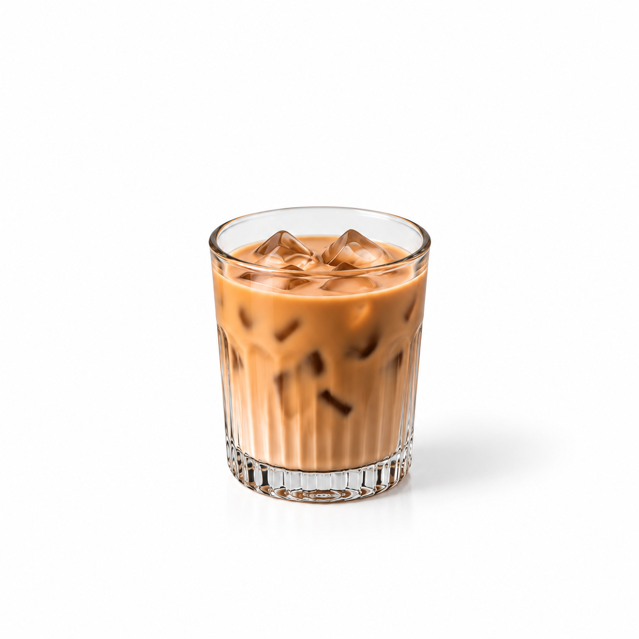 Iced masala chai in a tall glass with ice